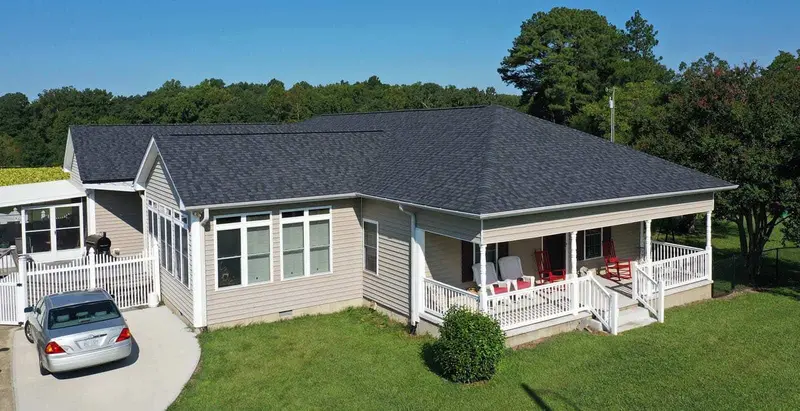 Drone view of a home with skylights installed by Chief Roofing